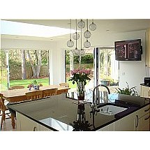 Stunning view from the kitchen looking out onto the open space, straight into the garding